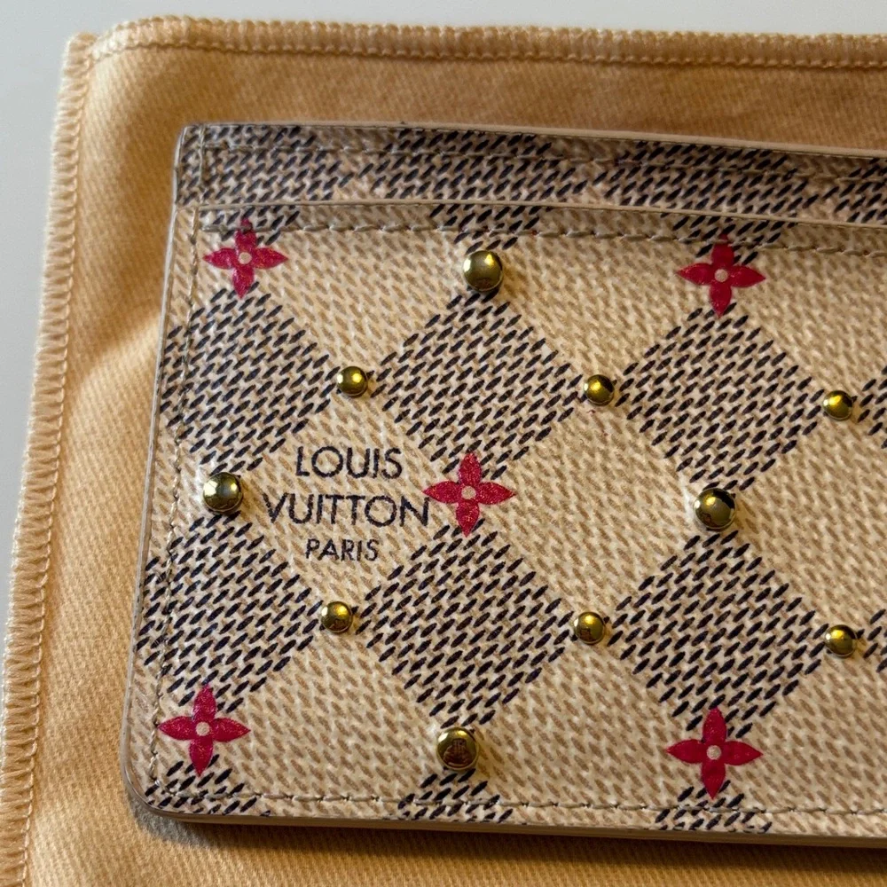 Louis Vuitton Damier Azur Studded Card Holder in the white and pink color